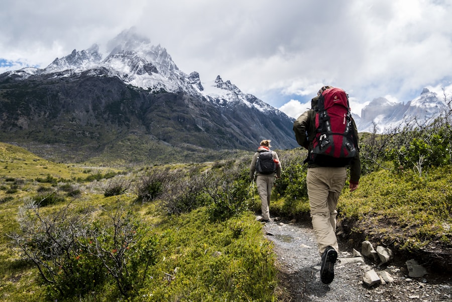 Hiker using headlamp on mountain trail